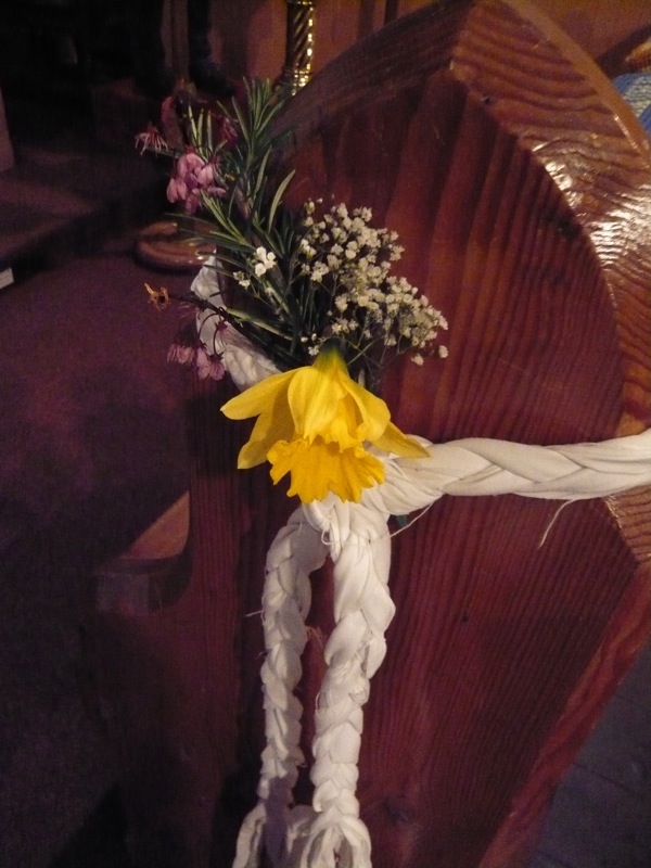 church pew decorated for Easter