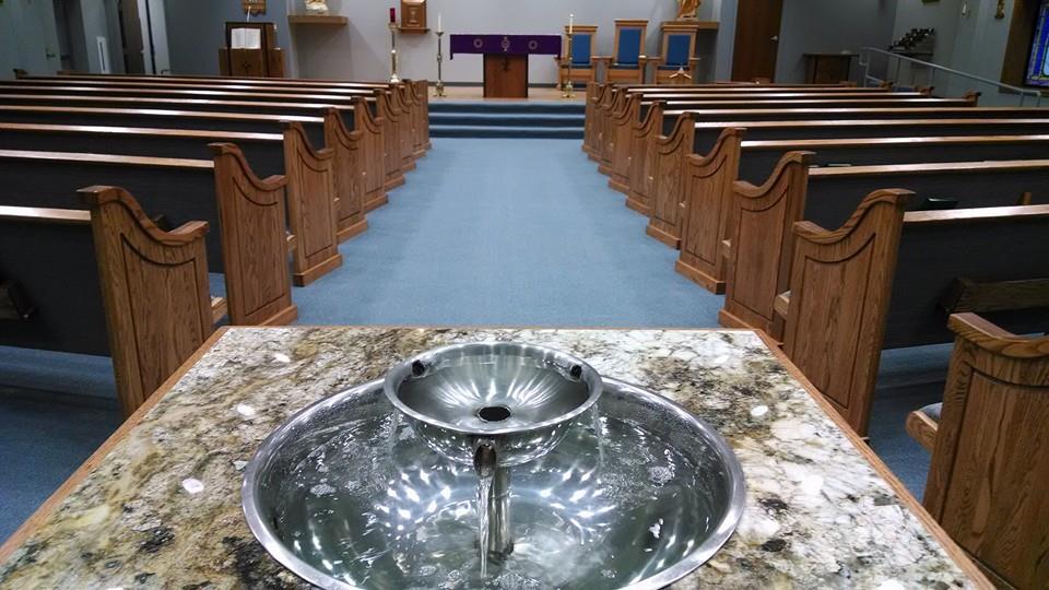 church pews and baptismal font