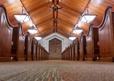rows of wooden church pews