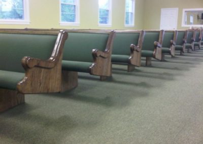 row of church pew ends
