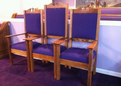 purple church chairs with curved tops